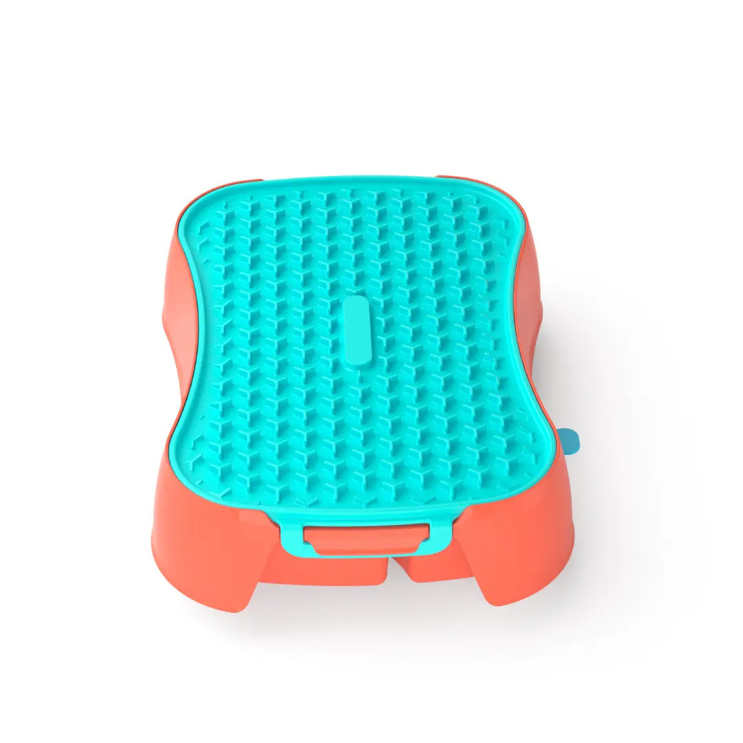 Back view of 4-in-1 slow feeder dog bowl warm ocean red with teal lick mat, showing handle and latch