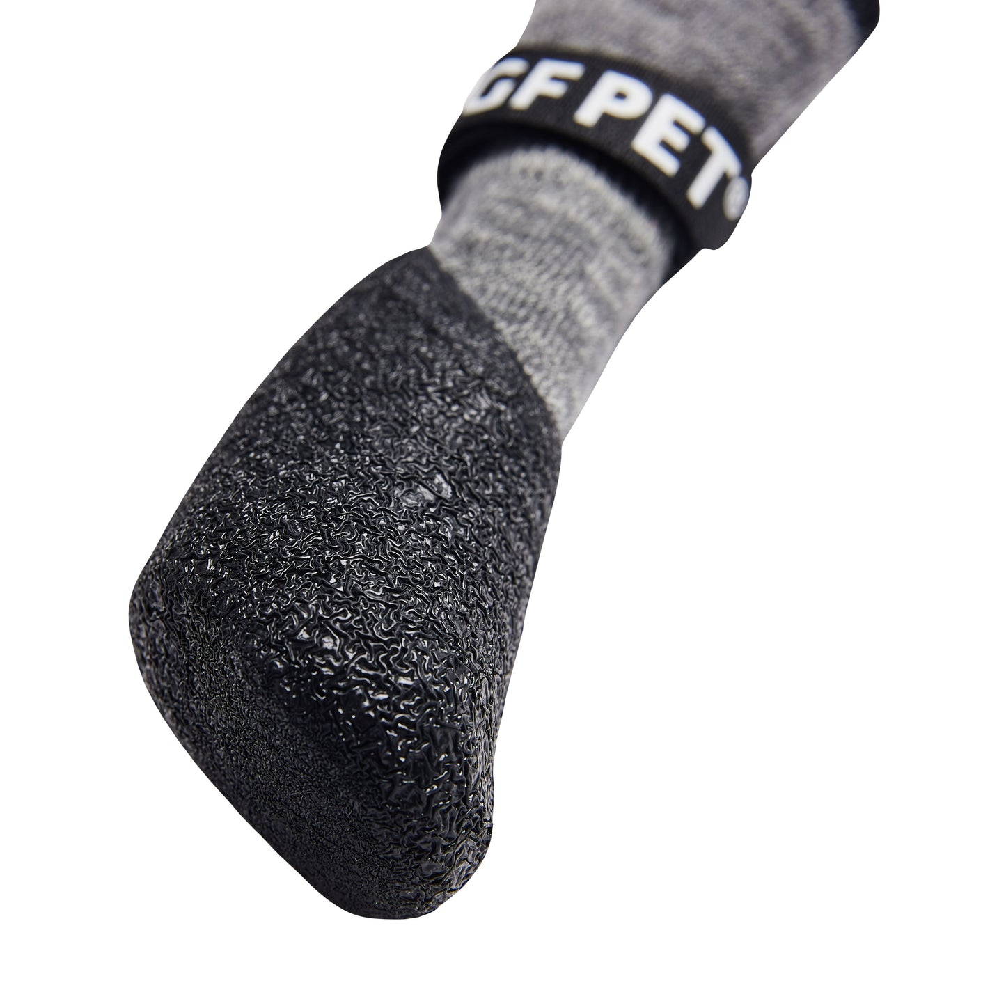 Bottom view of GF Pet charcoal all terrain dog boot showing ultra-grip textured rubber sole for snow ice and hot pavement protection