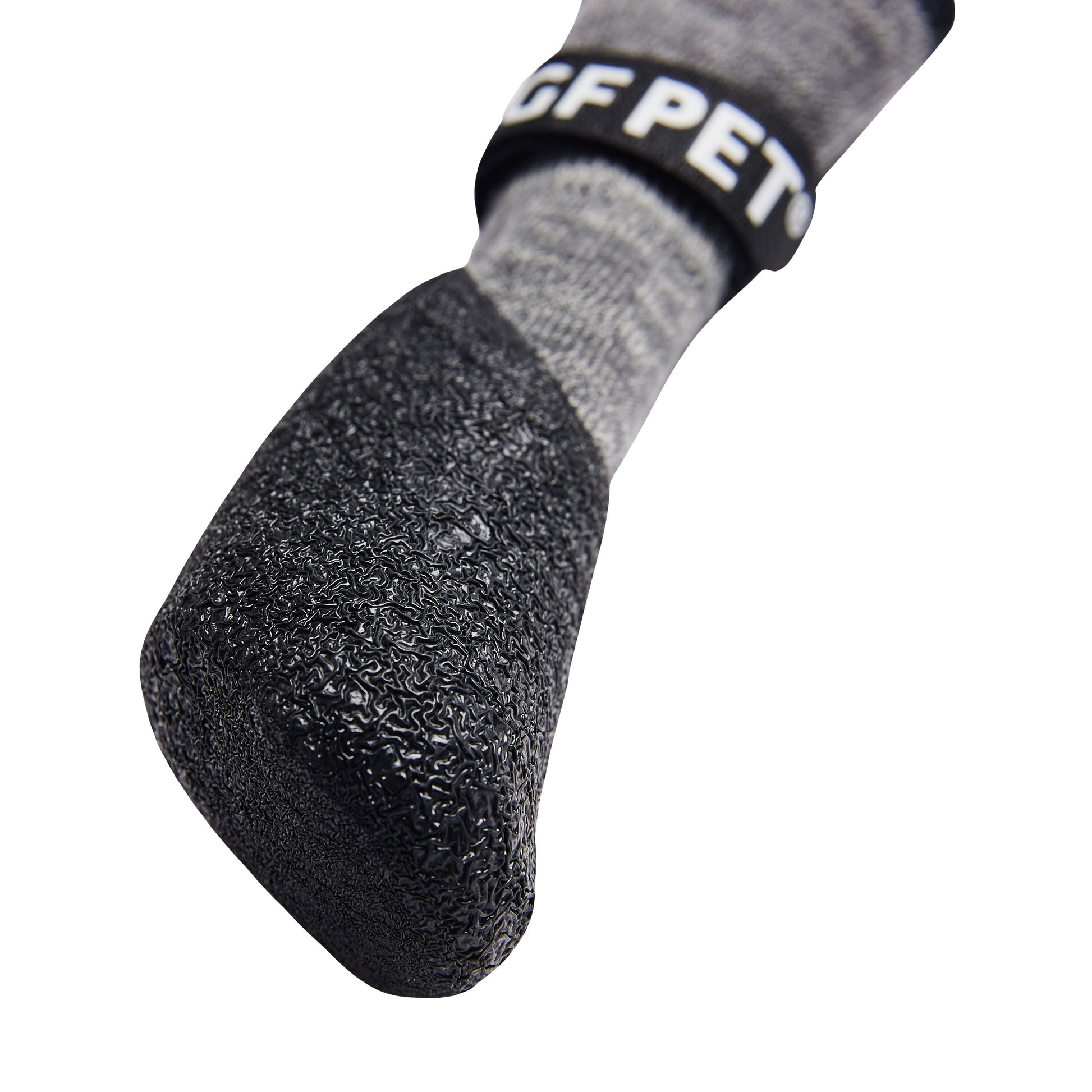 Bottom view of GF Pet charcoal all terrain dog boot showing ultra-grip textured rubber sole for snow ice and hot pavement protection