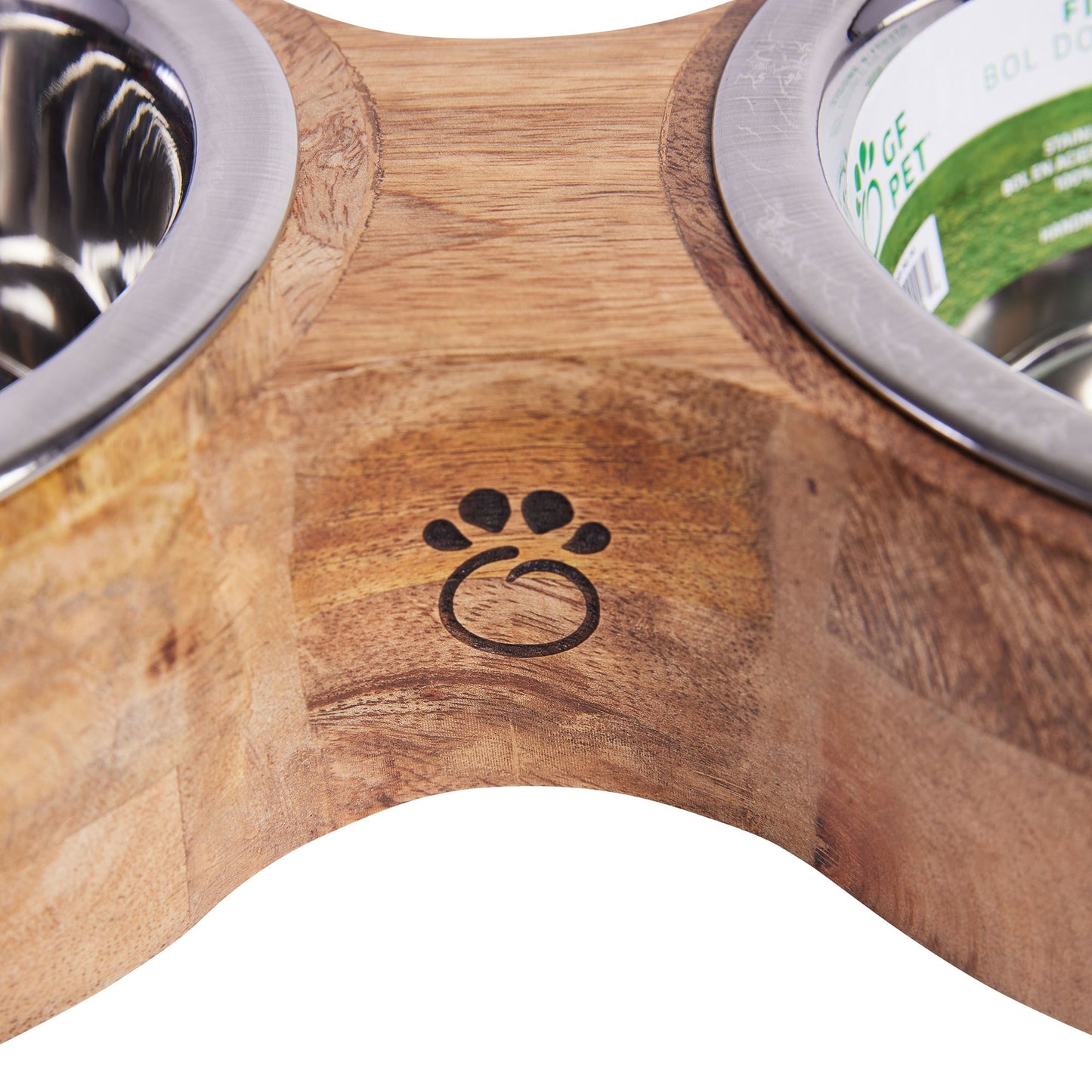 Top view of mango wood double diner showing paw print logo engraving with two stainless steel bowls