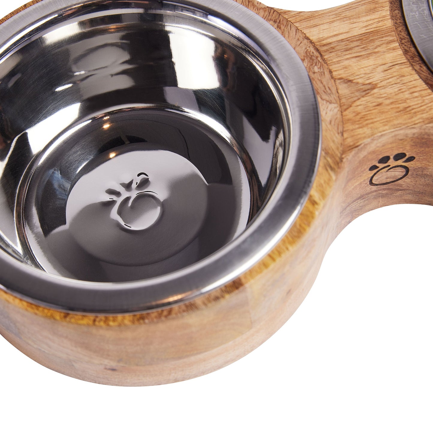 Close-up of stainless steel bowl insert with paw print logo in mango wood feeder holder