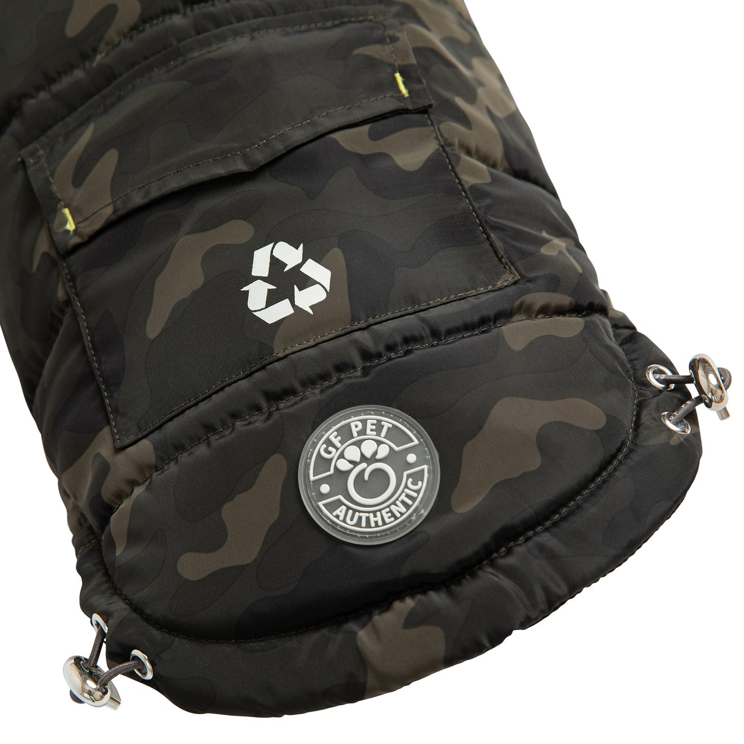 Close-up of GF Pet camouflage recycled parka rear pocket showing recycled polyester symbol and GF Pet Authentic logo badge